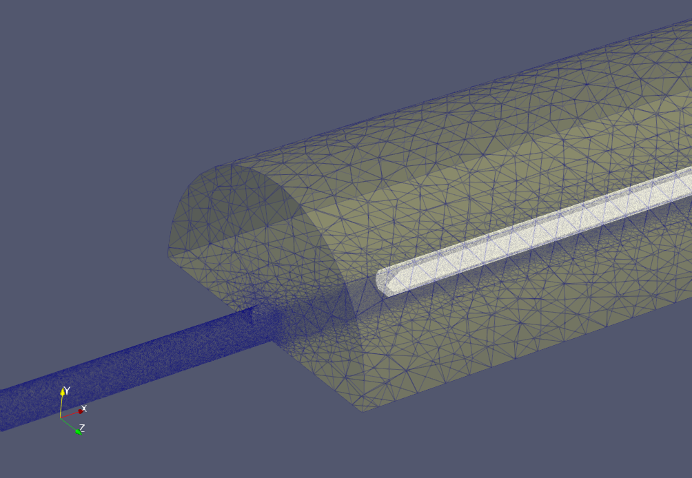 The (white) mesh around the train is “overset” on a (yellow) background mesh for the tunnel. By moving the train mesh through the tunnel mesh, we can simulate the unsteady motion of the train without needing to re-create a new mesh at each physical time step.